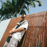 NBL Player Nelson Kahler wearing the Courtside Bench Track Pants in Faded Grey colour.