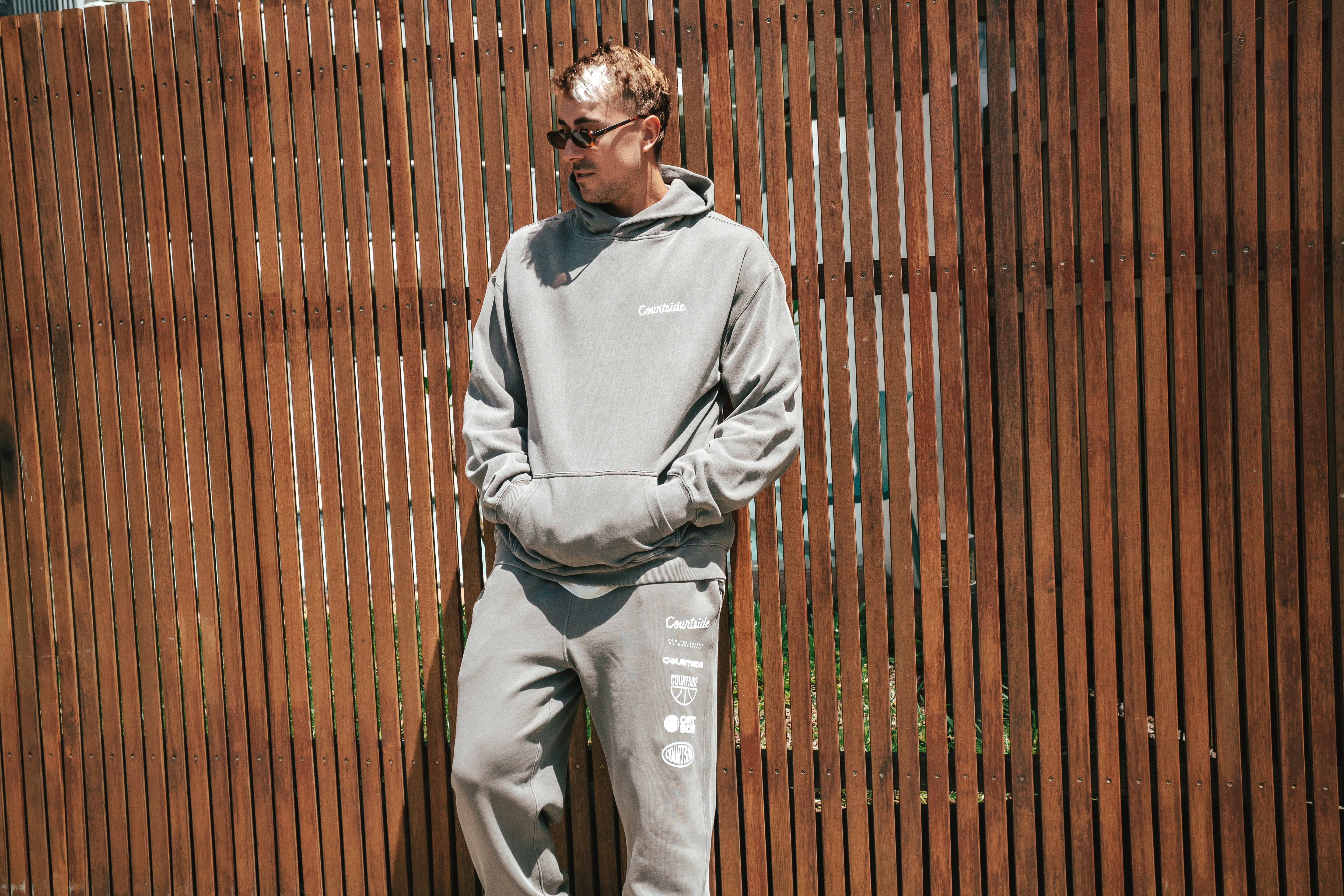 NBL Player Nelson Kahler wearing the Courtside Big Dreams Hoodie in Faded Grey colour.