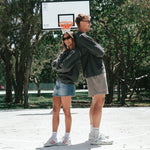 NBL Player Nelson Kahler and Gabi wearing the Courtside Half Court Crew in Faded Black colour.