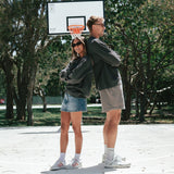 NBL Player Nelson Kahler and Gabi wearing the Courtside Half Court Crew in Faded Black colour.