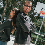 NBL Player Nelson Kahler and Gabi wearing the Courtside Half Court Crew in Faded Black colour.