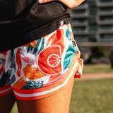 NBL1 female player Ash wearing Courtside basketball shorts, shown close up details of side