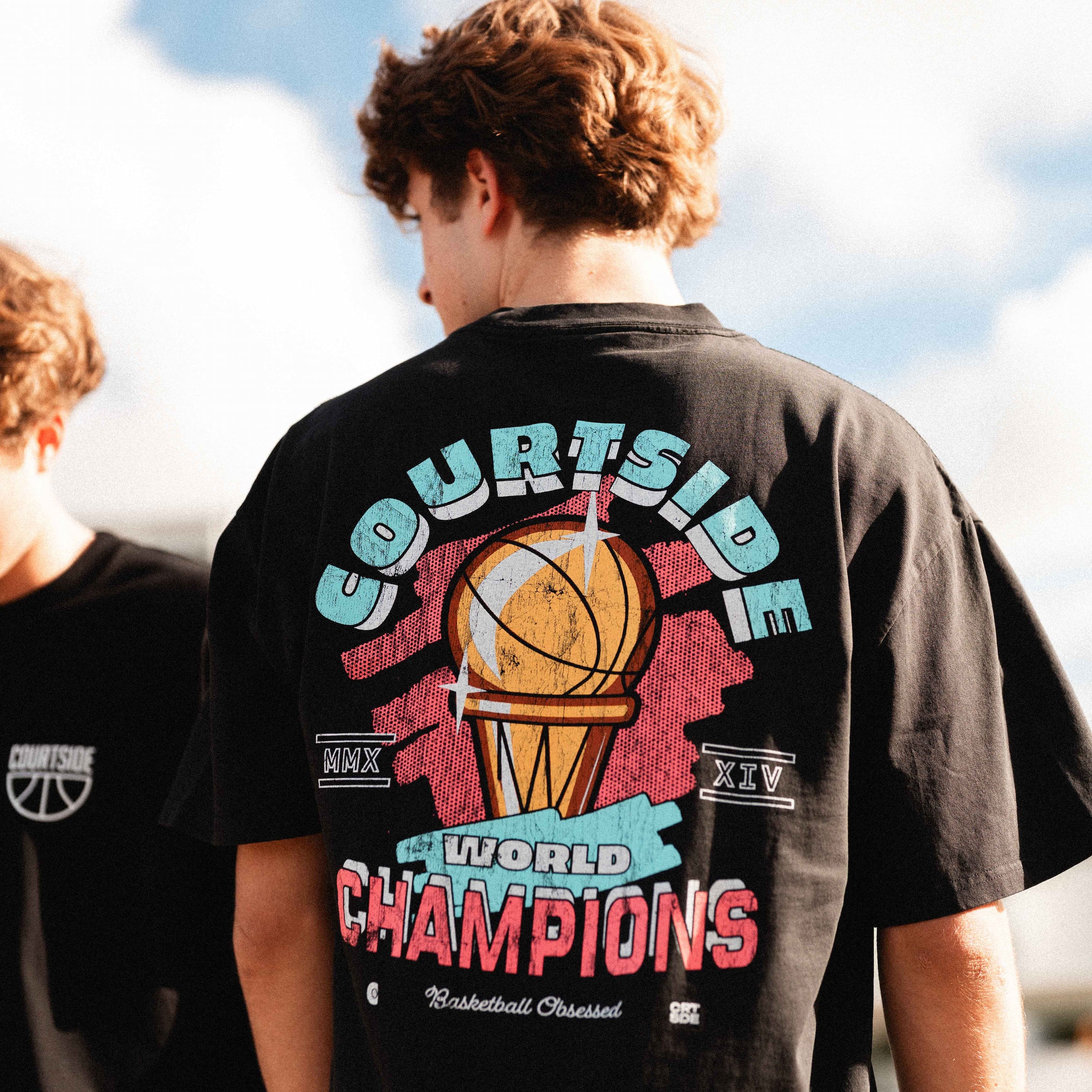 back of the champs tee showing detail