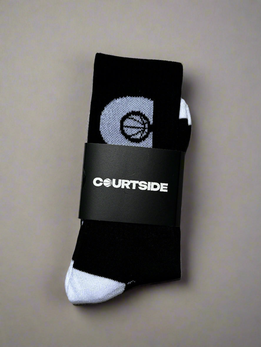 Black socks with Icon logo C in white, white heels and toe tips