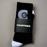 Black socks with Icon logo C in white, white heels and toe tips