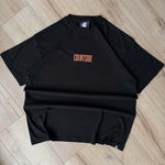 Black t-shirt with 'COURTSIDE' text on a wooden floor