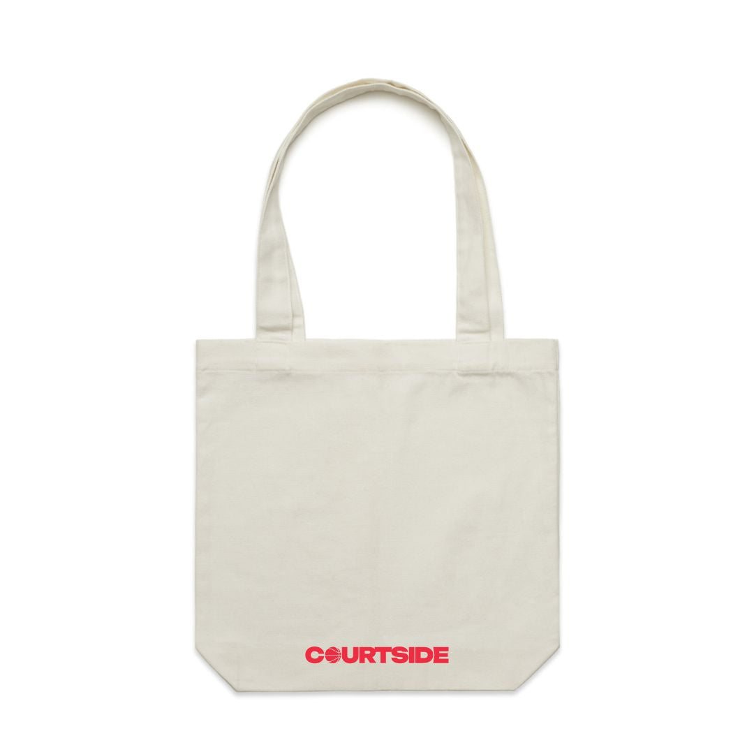 A cream tote bag with the word 'COURTSIDE' printed in red along bottom