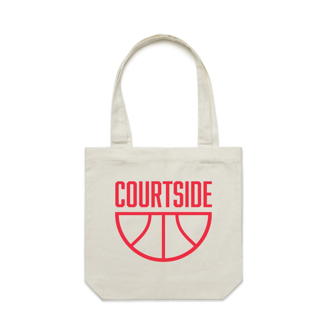 A cream tote bag with the word 'COURTSIDE' printed in red alongside a basketball icon.