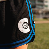 Courtside Black & Royal Blue DPOYW basketball short in women's cut showing details