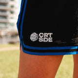 Courtside Black & Royal Blue DPOYW basketball short in women's cut showing details