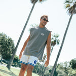 Courtside DPOY cream with royal blue detail basketball shorts shown on NBL Player Nelson Kahler 
